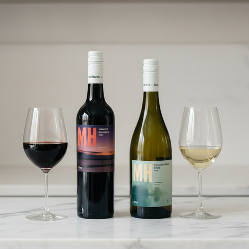MH Wine Bottles on Marble Benchtop with Red Wine